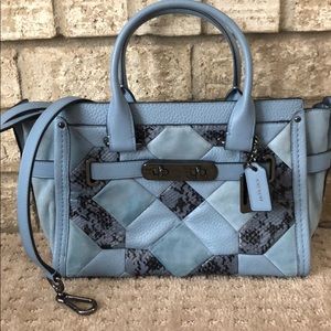 Coach purse w detachable crossbody strap.